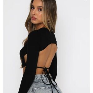 White fox long sleeve cut out in black size small. Only worn once